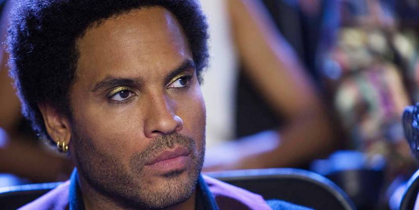 Lenny Kravitz as Cinna at the talk show in The Hunger Games.