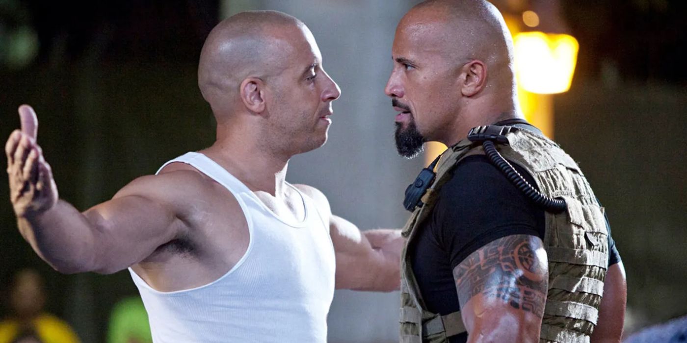 Dom (Vin Diesel) and Hobbs (Dwayne Johnson) stare each other down in Fast Five.
