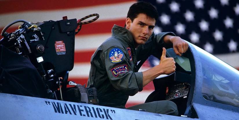 Tom Cruise as LT Pete "Maverick" Mitchell In Top Gun (1986), sitting on his plane in "Maverick."