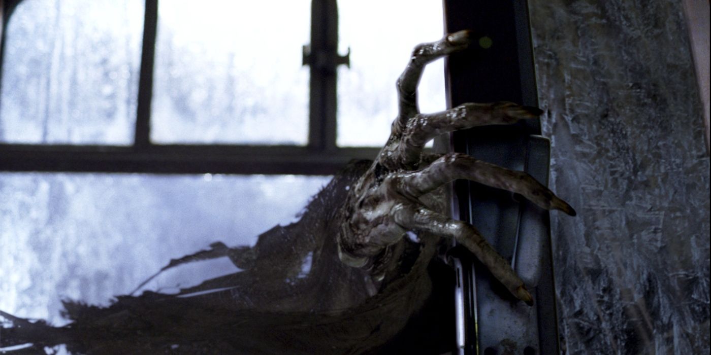 The dementor hand opening the compartment door in Harry Potter and the Prisoner of Azkaban