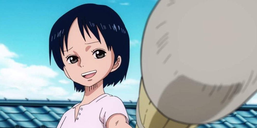 Kuina tend son bâton d'entraînement dans One Piece.