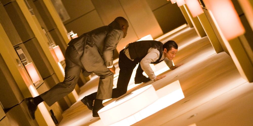 Arthur fighting a projection in the rotating hallway in Inception