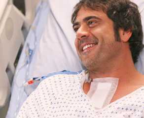 Denny Duquette is smiling in hospital bed in Grey's Anatomy.