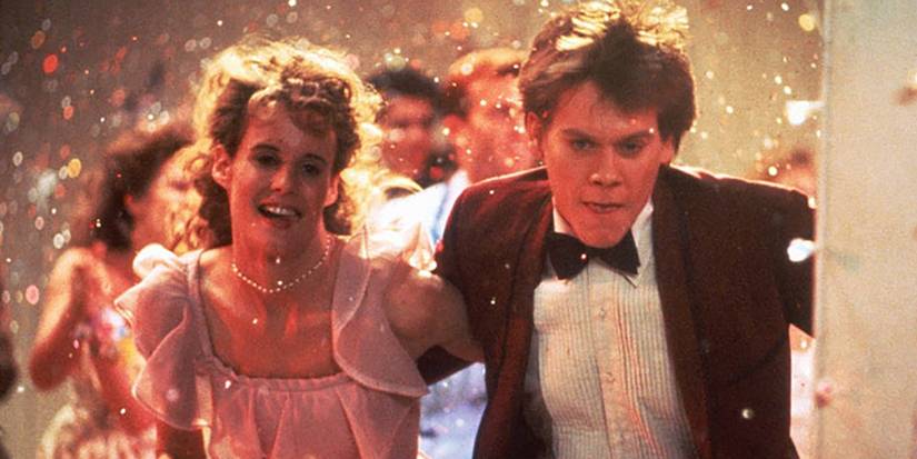 Kevin Bacon and Lori Singer dance at the prom in Footloose.