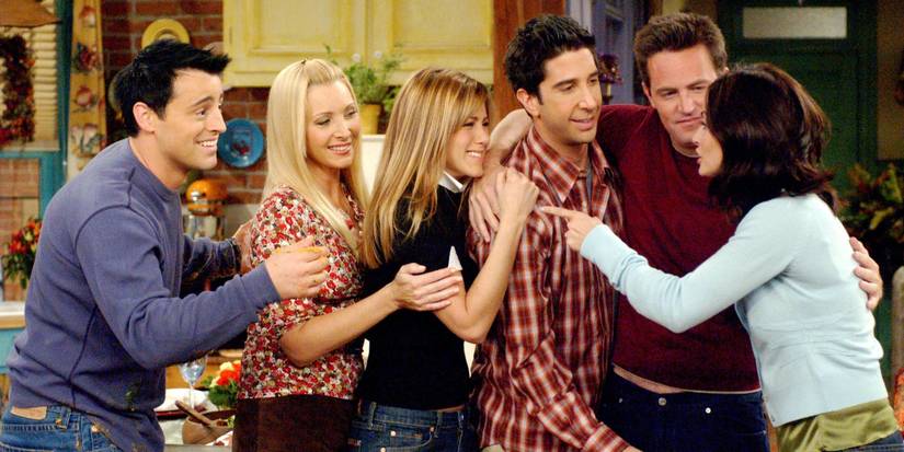 Joey, Phoebe, Rachel, Ross, Chandler, and Monica hug in "The Last One: Part 2" finale of Friends.