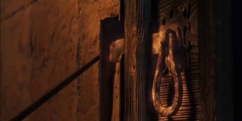 A magical door about to be opened with the Alohomora spell in Harry Potter.