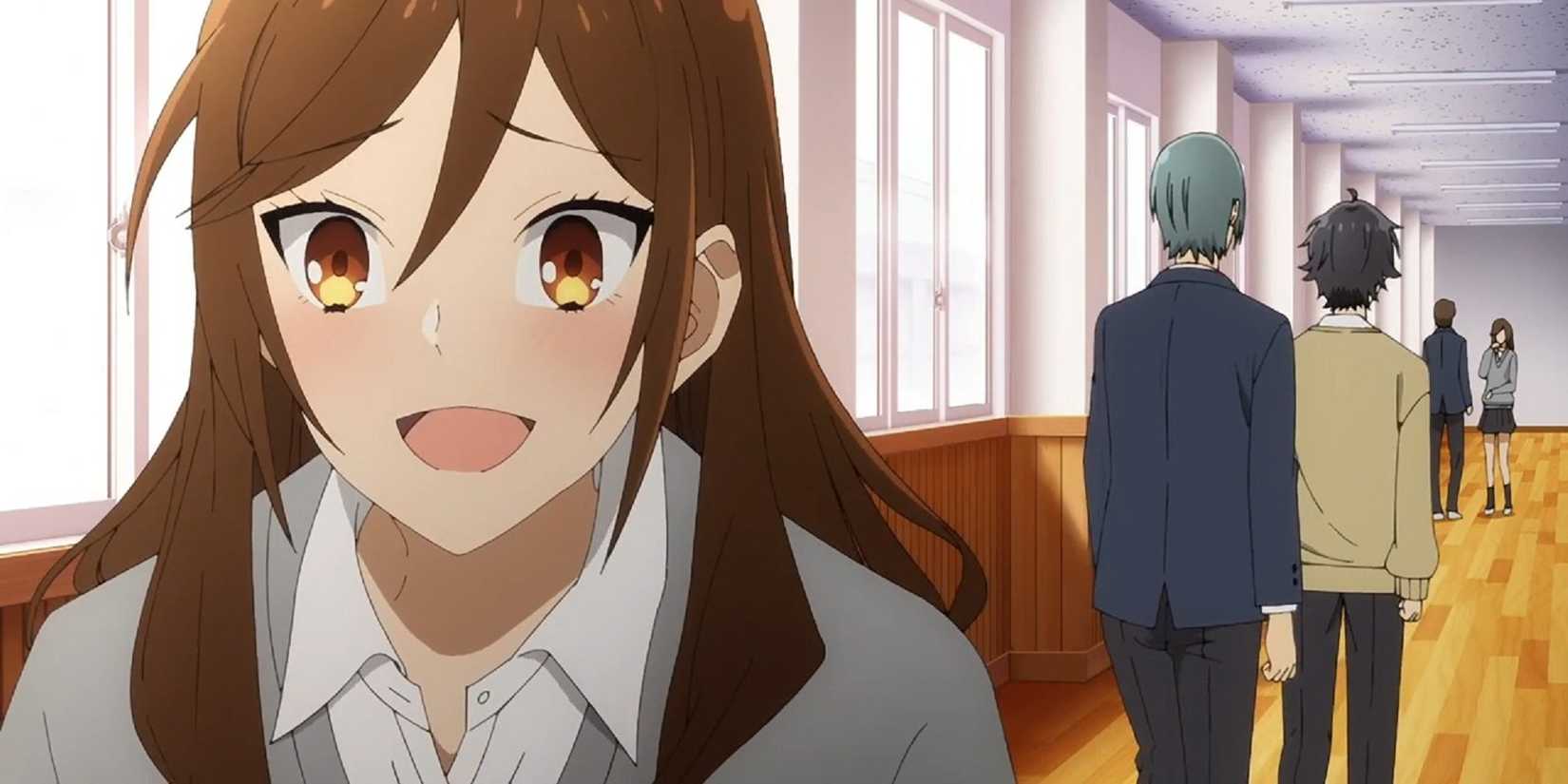 Kyoko Hori looks excited while her classmates move away from her.