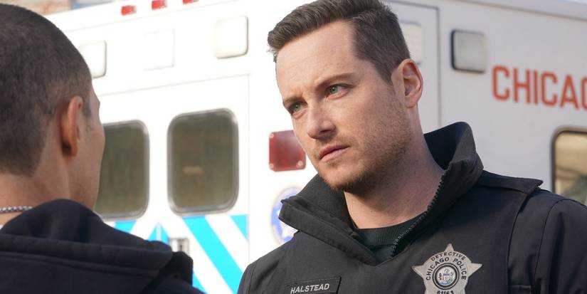 Jay Halstead looks at Dante Torres in front of an ambulance on Chicago PD