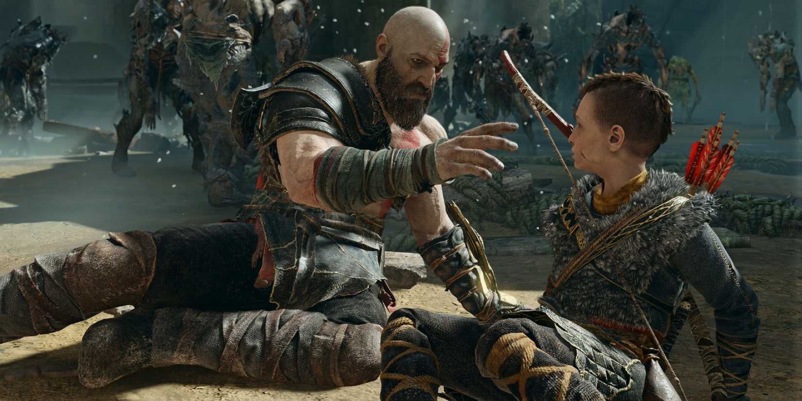 Kratos checks on Atreus while surrounded by enemies in God of War (2018)
