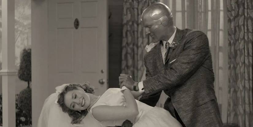 Vision (Paul Bettany) dips Wanda (Elizabeth Olsen) in the black and white WandaVision pilot episode