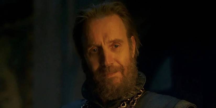 Rhys Ifans as Otto Hightower, smiling in House of the Dragon.