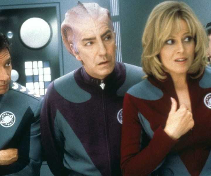 Tim Allen looks on with castmates on the set of Galaxy Quest