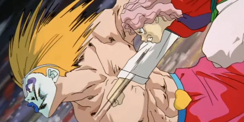 Genkai punches Suzuki in a tournament in Yu Yu Hakusho.