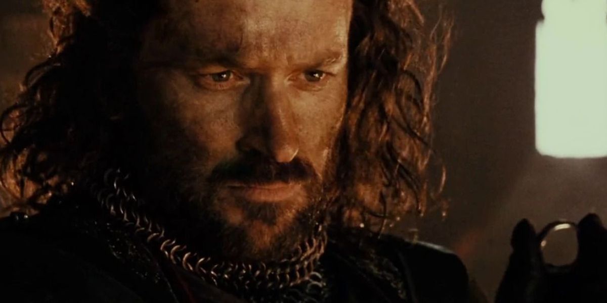 Isildur stares at the One Ring in Lord of the Rings in Mount Doom