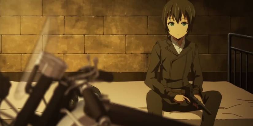 Kino assis sur un lit tenant une arme à feu dans Kino's Journey.
