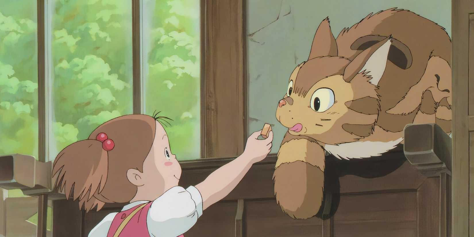 Mei, de cuatro años, alimenta al Kittenbus en Mei y el Kittenbus de Studio Ghibli.