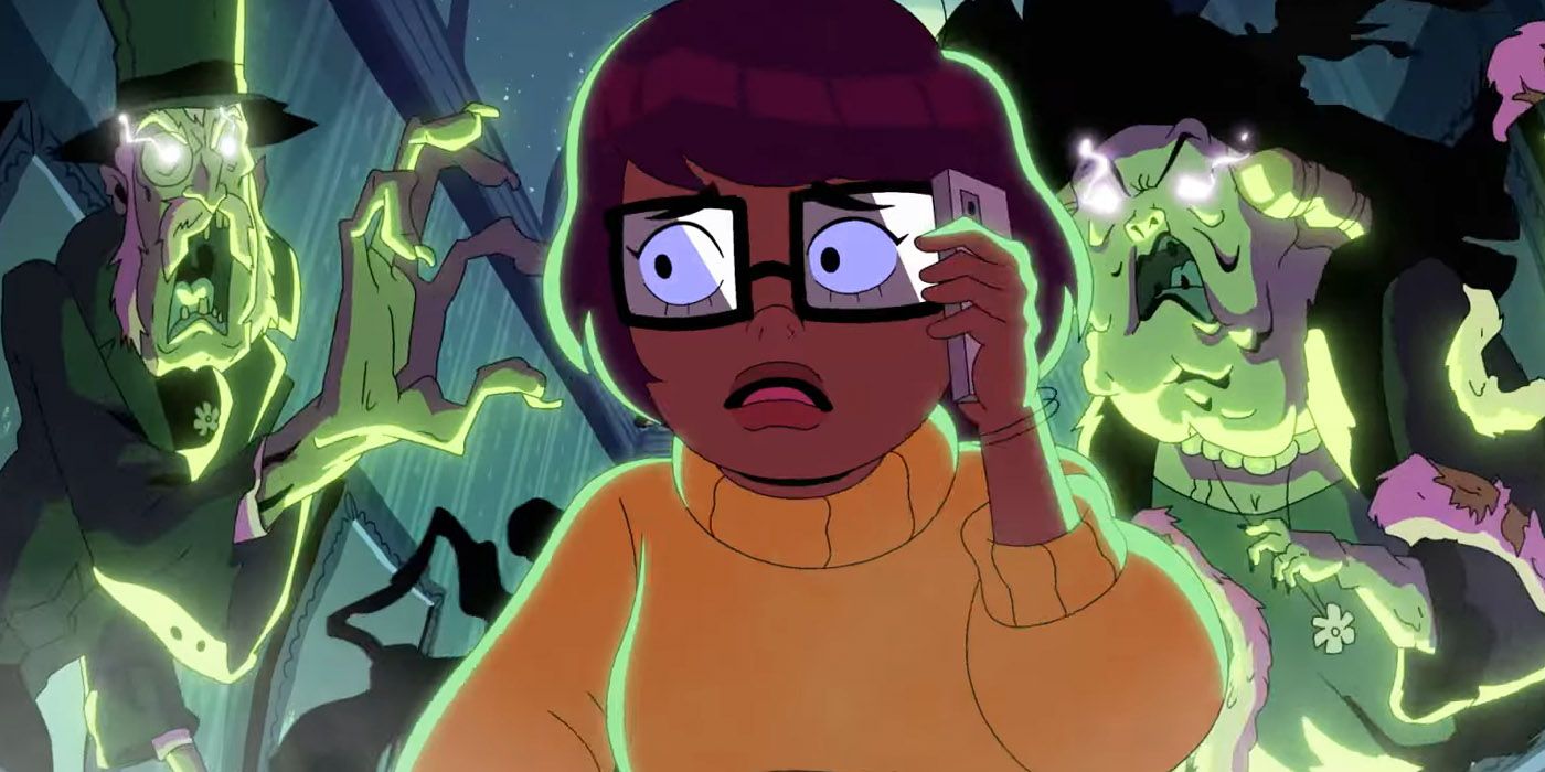 Velma: Mindy Kaling's Velma Dinkley talks on her phone while monsters creep up on her from behind.
