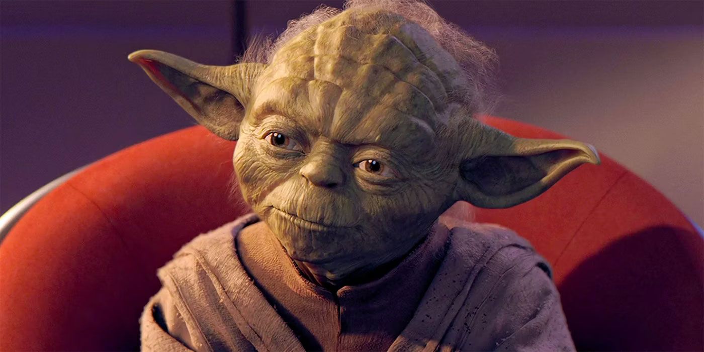 Yoda sitting in a red chair in the Jedi Council room in Star Wars Episode I The Phantom Menace.