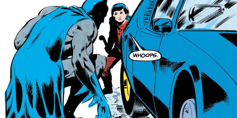 Batman catching Jason Todd stealing tires