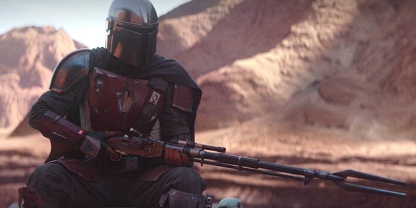 The Mandalorian holding a Amban Rifle