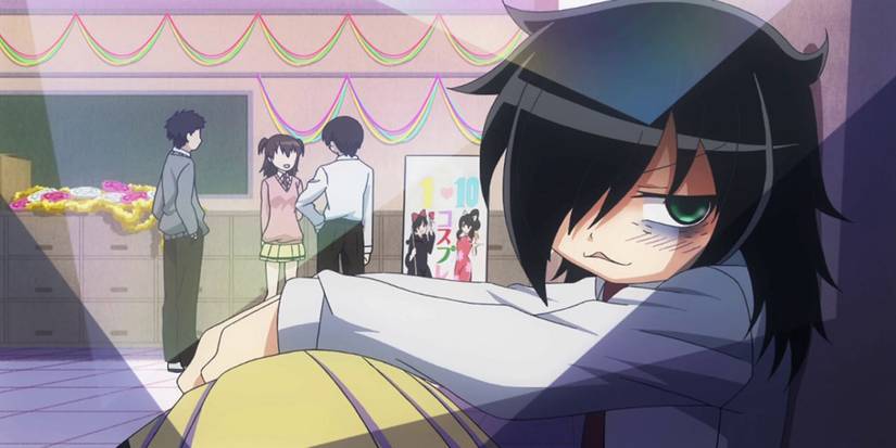 The protagonist Tomoko sits in a corner looking gloomy in Watamote