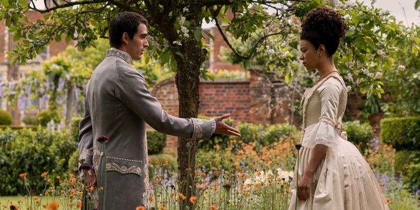 George and Charlotte meet in the garden in Queen Charlotte: A Bridgerton Story Season 1, Episode 1