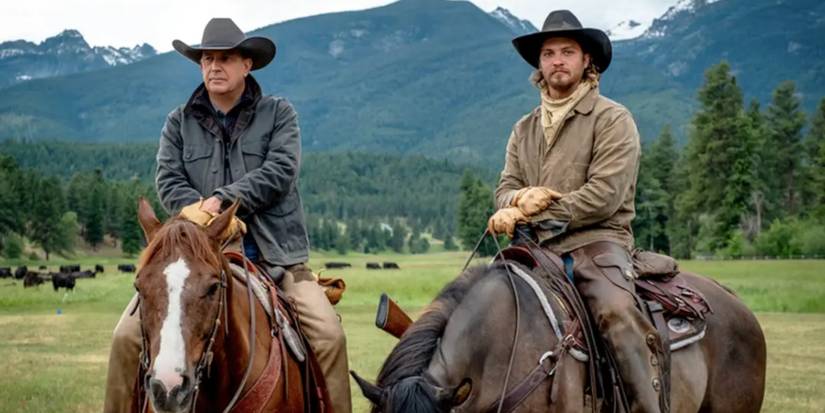 John Dutton (Kevin Coster) and Kayce Dutton (Luke Grimes) ride horseback on the series Yellowstone.