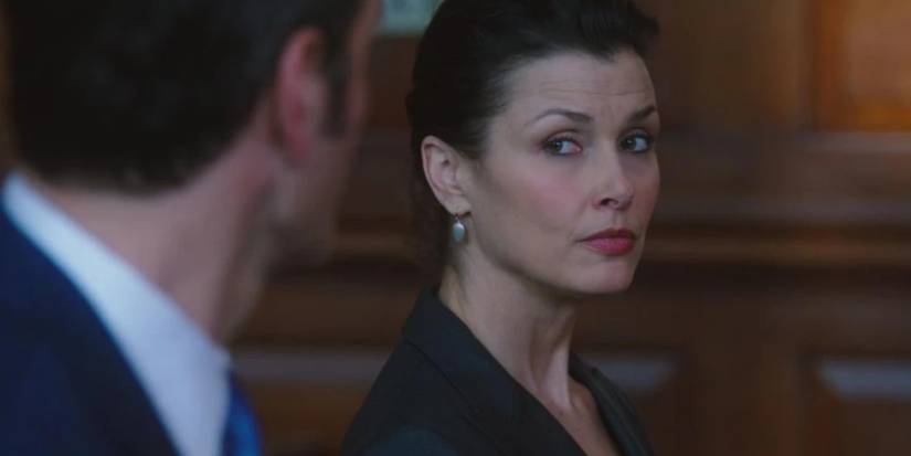 Erin Reagan looking at a fellow attorney, her ex-husband, while in the court room in Blue Bloods.