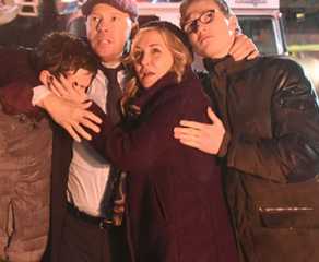 Danny and his family huddle together after an explosion in Blue Bloods.