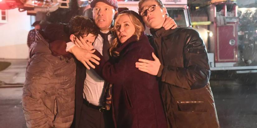 Danny and his family huddle together after an explosion in Blue Bloods