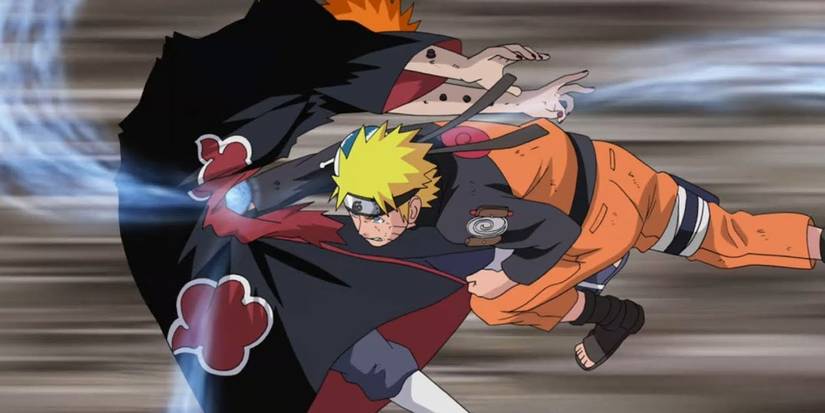 Naruto Uzumaki is hitting Pain in the stomach with the Rasengan in Naruto: Shippuden.