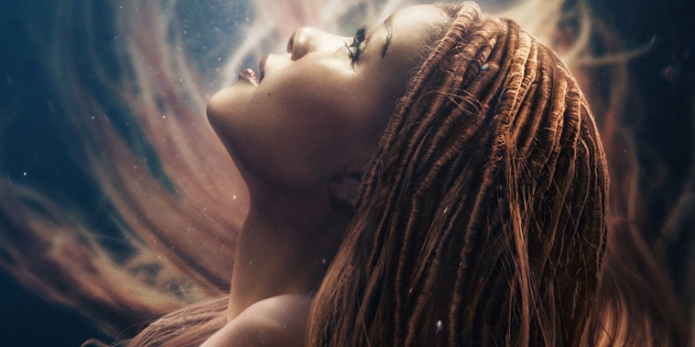 Halle Bailey as Ariel looking up in The Little Mermaid (2023).