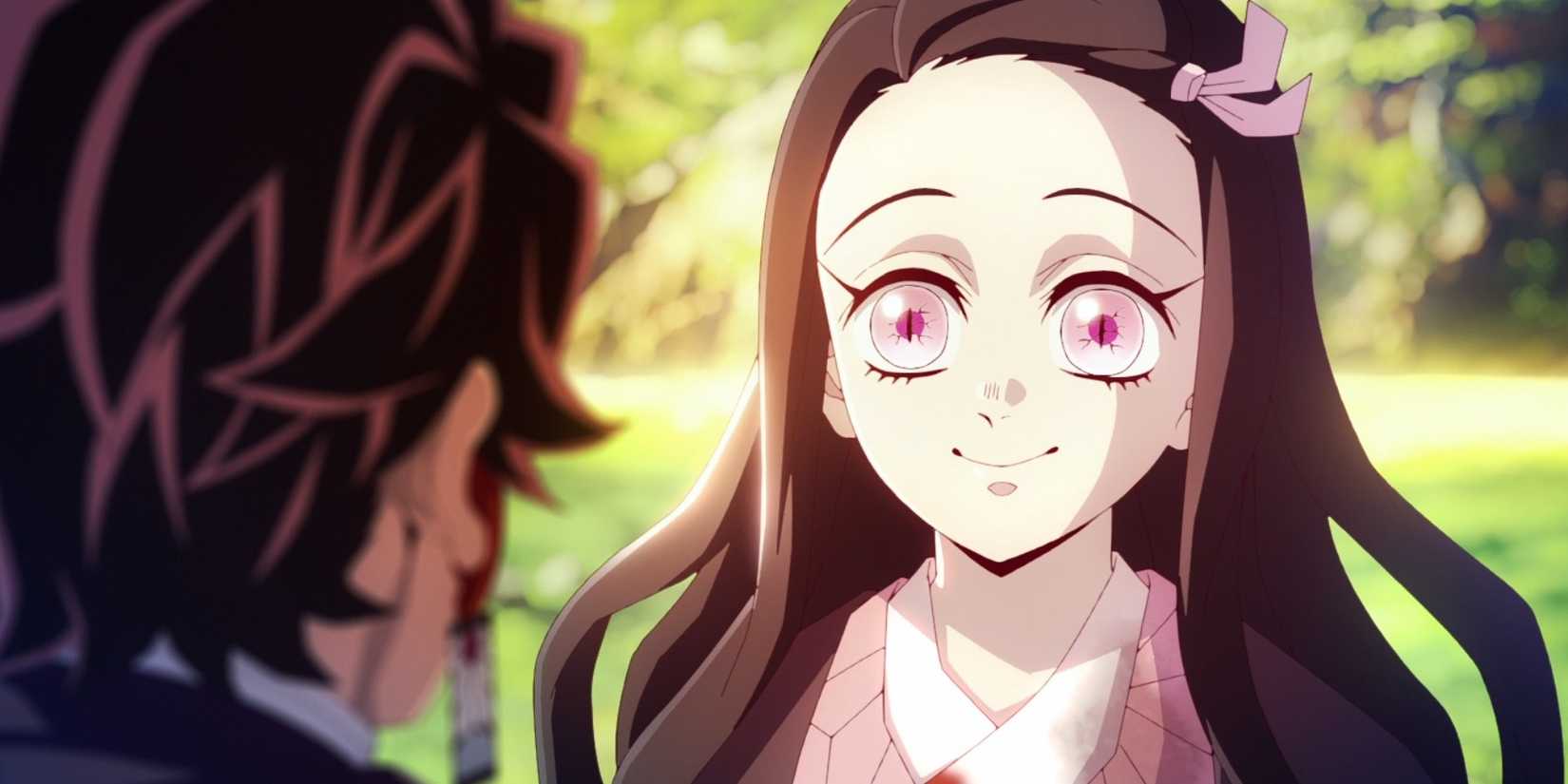 Nezuko smiles at Tanjiro in Demon Slayer