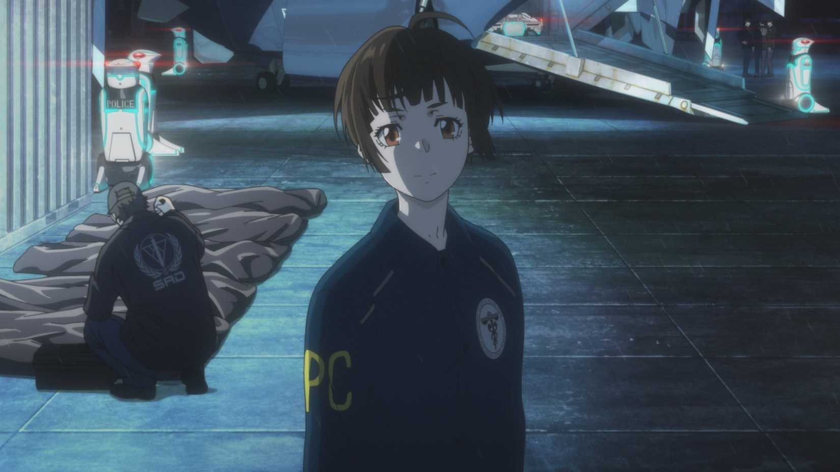 Akane Tsunemori smiling slightly into the camera at a crime scene in Psycho-Pass Providence