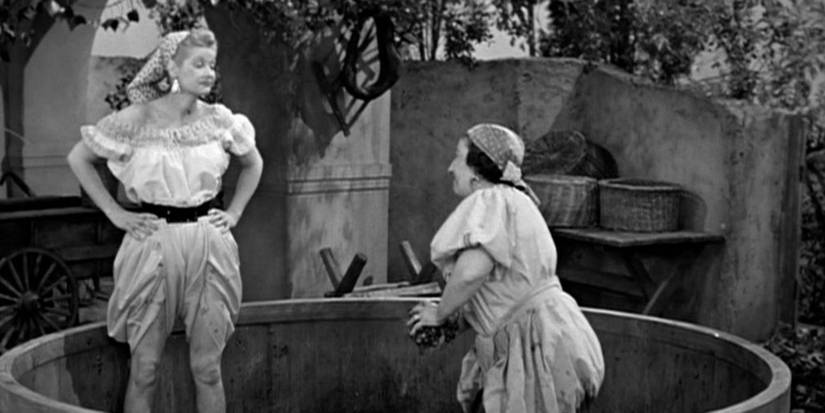 Lucy stomping grapes with an Italian woman in I Love Lucy, "Lucy's Italian Movie"