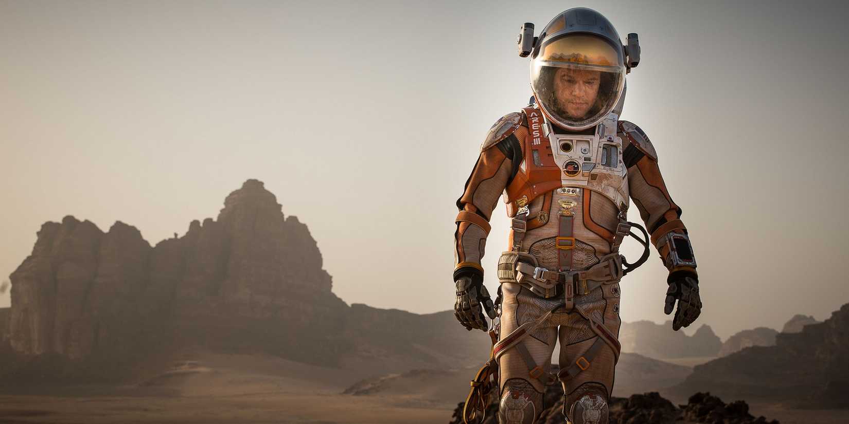 Matt Damon is Mark Watney in a space combination on Mars in the Martian.