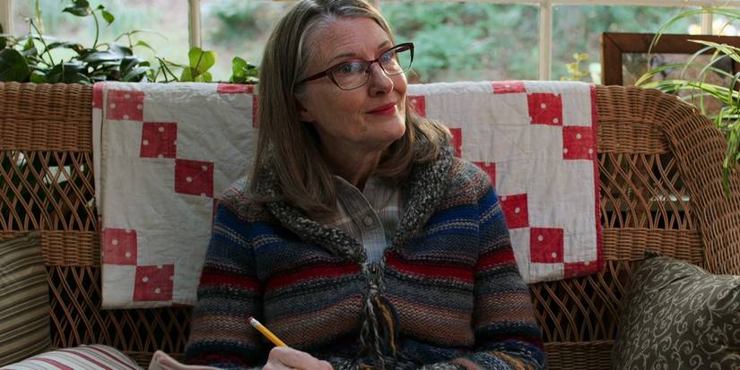 Hope writes in a journal on her couch in Virgin River