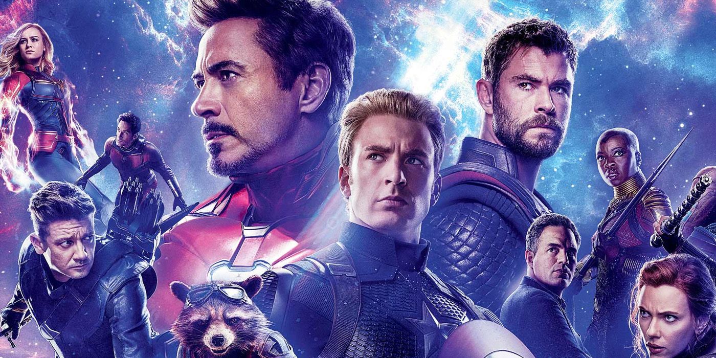 The cast of Avengers: Endgame pose against a starry blue background