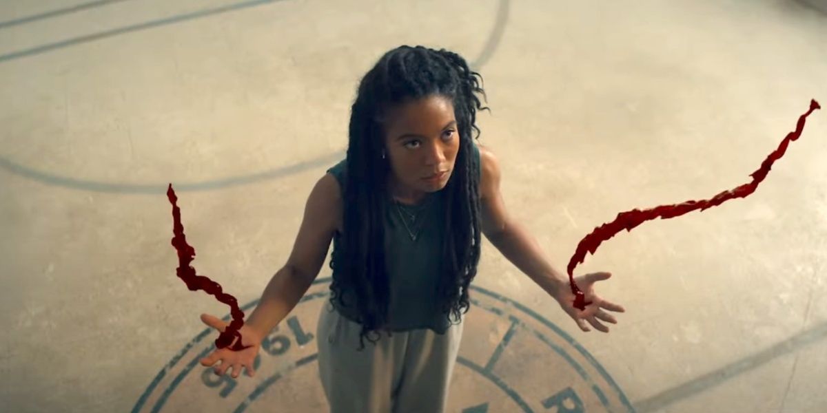 Jaz Sinclair as Marie Moreau in Gen V using her powers to have blood come out of her hands in controlled towers