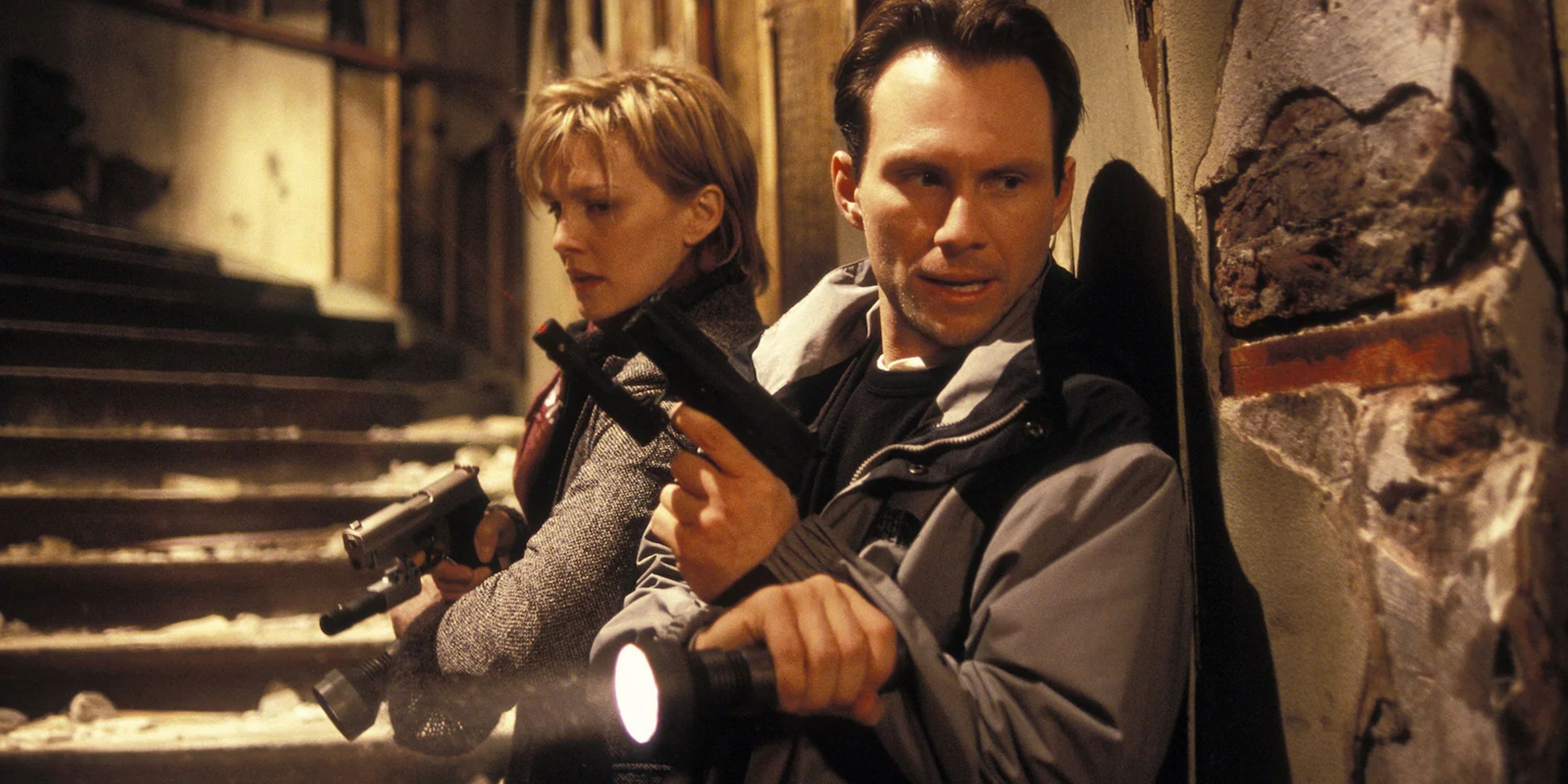 J.D. and Sara hold their guns in Mindhunters