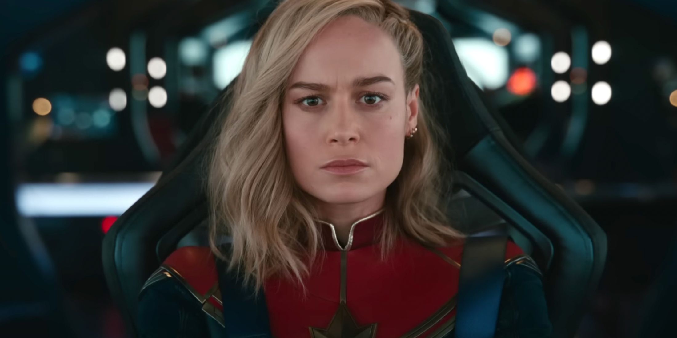 A dejected Captain Marvel (Brie Larson) sits in her pilot chair in The Marvels. 