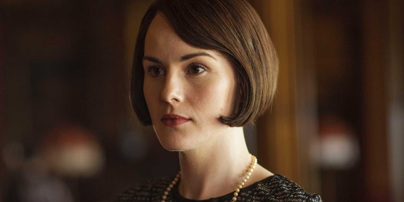 A close-up of Michelle Dockery as Lady Mary in the TV series Downton Abbey.