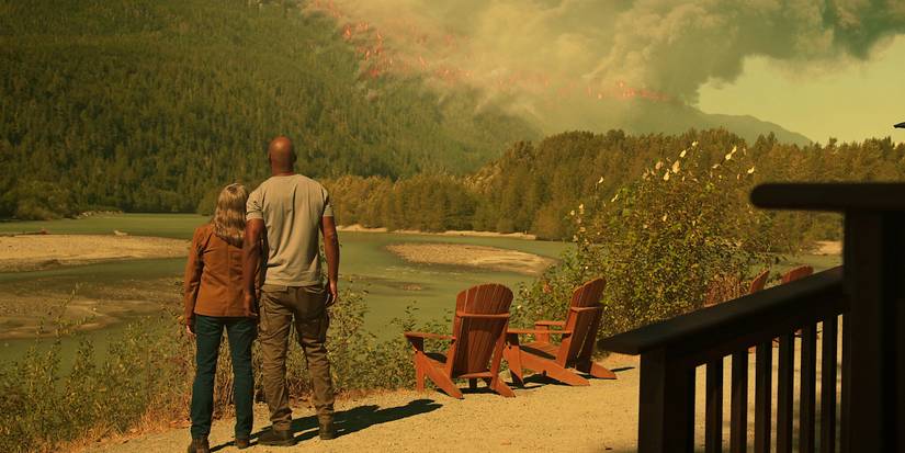 Two Virgin River characters look on at a wildfire