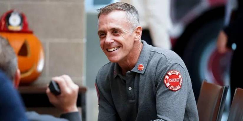 David Eigenberg smiles as Christopher Herrmann on Chicago Fire