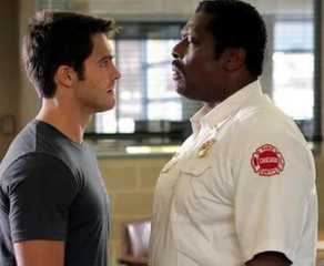 Steven R. McQueen as Jimmy Borrelli has a stand off with Eamonn Walker as Wallace Boden with Monica Raymund as Gabriela Dawson looking on in the background on Chicago Fire
