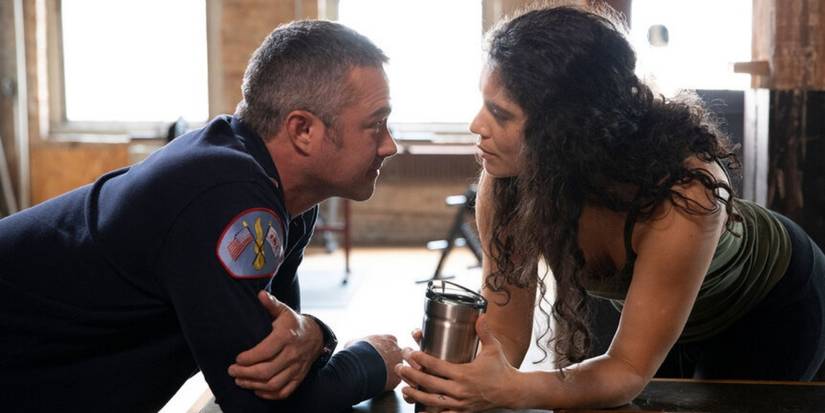 Taylor Kinney as Kelly Severide talks with Miranda Rae Mayo as Stella Kidd on Chicago Fire