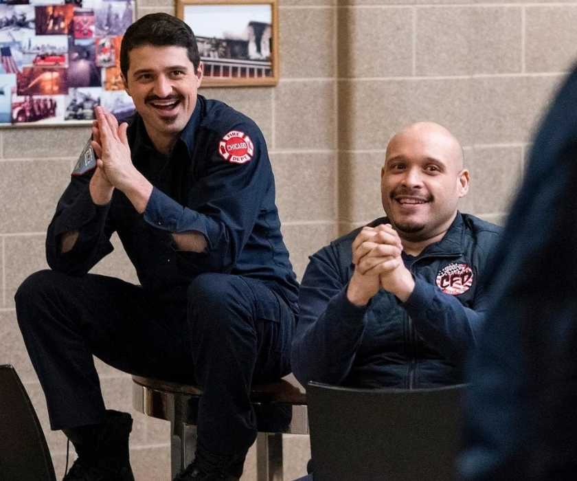 Yuri Sardarov as Brian 'Otis' Zvonecek sits with Joe Minoso as Joe Cruz on Chicago Fire