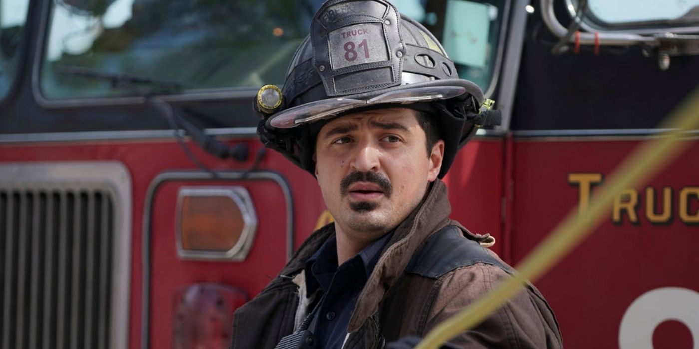 Yuri Sardarov stands in front of a fire truck as Brian 'Otis' Zvonecek on Chicago Fire