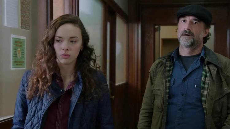 Alina Taber as Lexi Olinsky walks down a hall with Elias Koteas as Alvin Olinsky on Chicago P.D