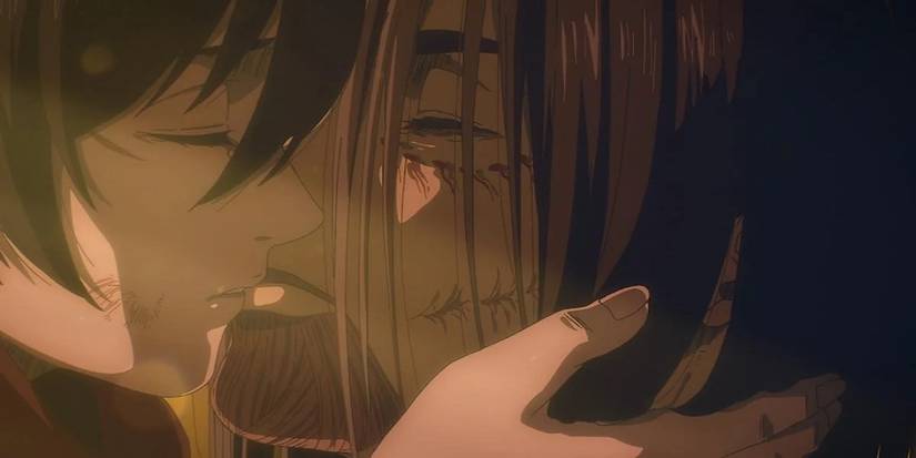 Mikasa kisses Eren's head in the Attack on Titan finale before killing him.